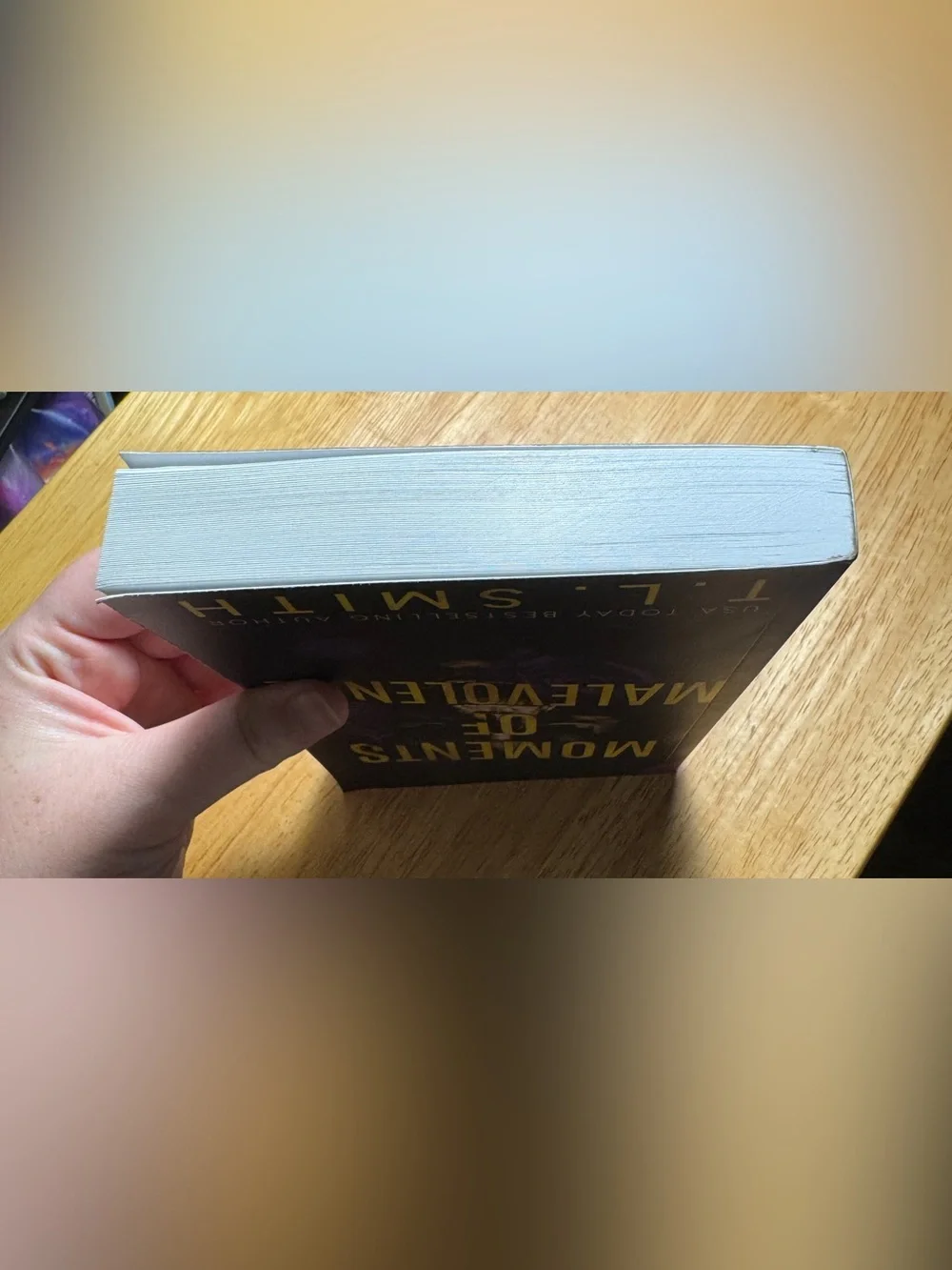 Moments of Malevolence by T. L. Smith